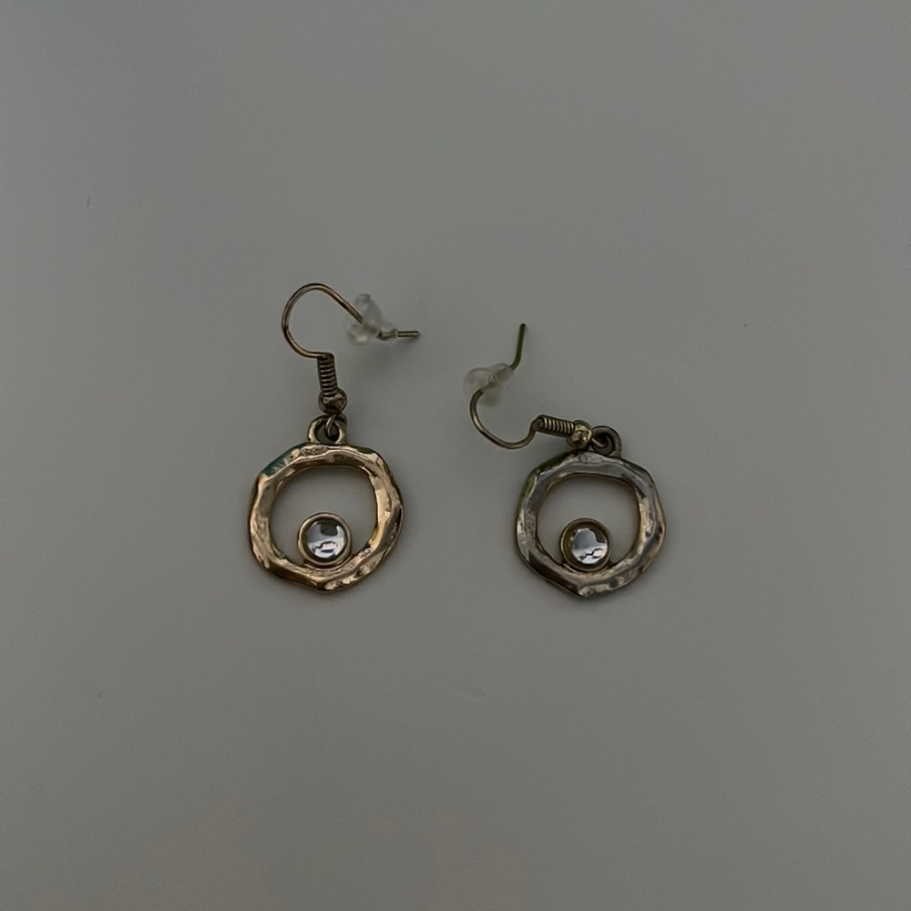 earring one silver one gold